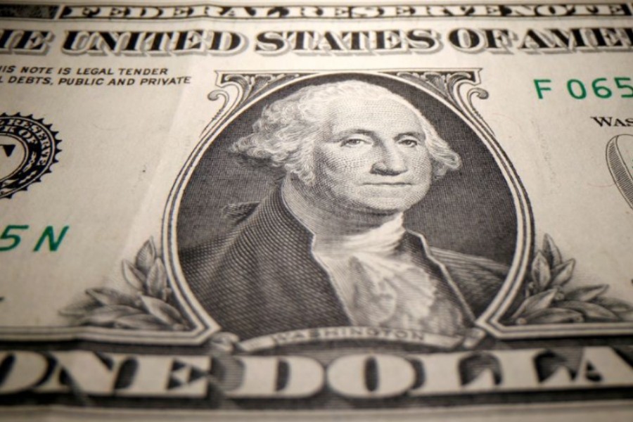 Dollar gains as yields hold near recent highs