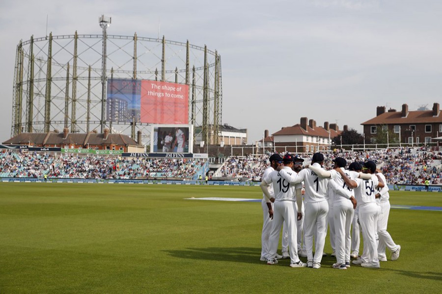 India's Virat Kohli and teammates in a huddle before play — Action Images via Reuters