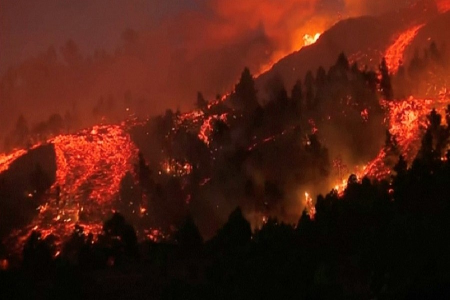 Red-hot lava spews from volcano in Spain's Canary Islands