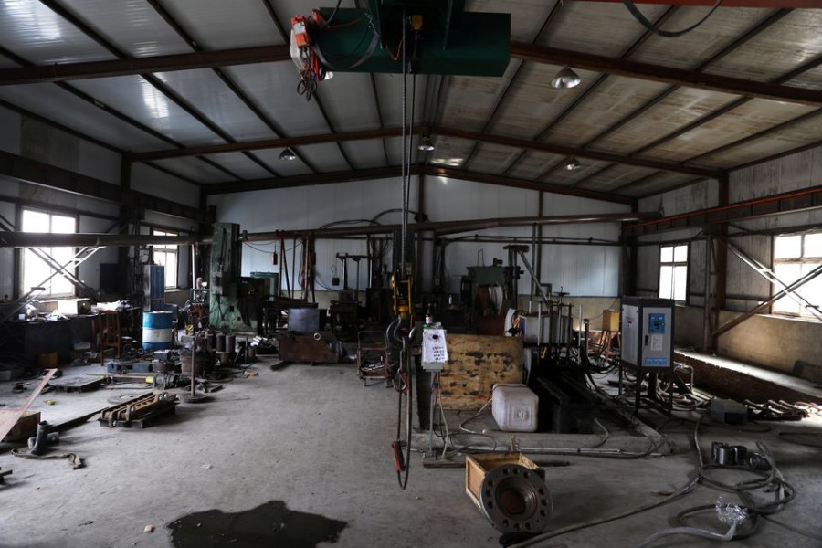 Machinery is seen at a factory specialising in heat treatment on metals, which is out of operation, at an industrial park in Shenyang, Liaoning province, China on September 30, 2021 — Reuters photo