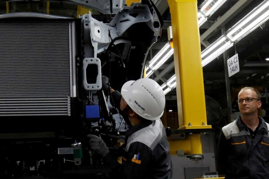 A man works at an assembly line of Vinfast Auto factory in Hai Phong city, Vietnam, June 14, 2019. REUTERS