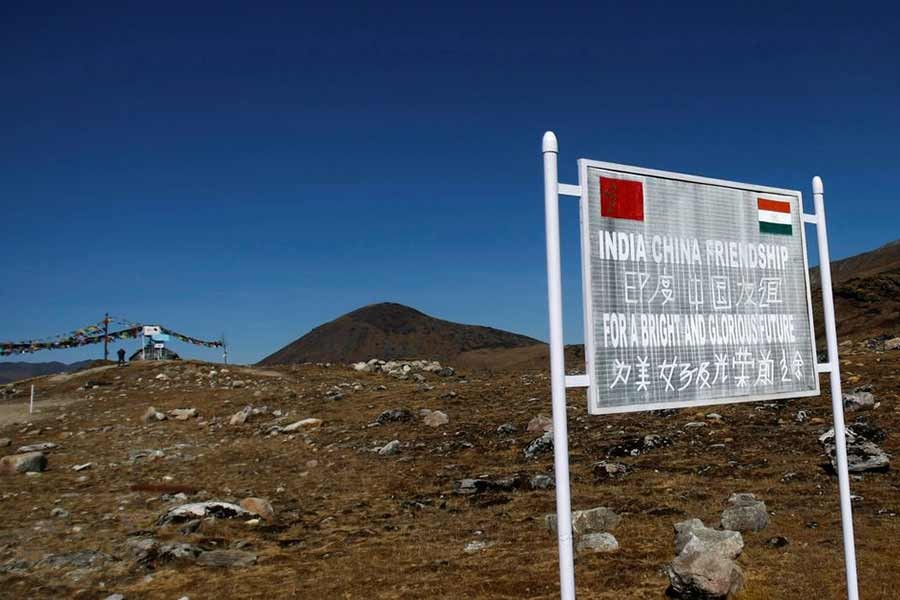 The Reuters file photo shows a signboard at the Indian side of the Indo-China border at Bumla, in the northeastern Indian state of Arunachal Pradesh.