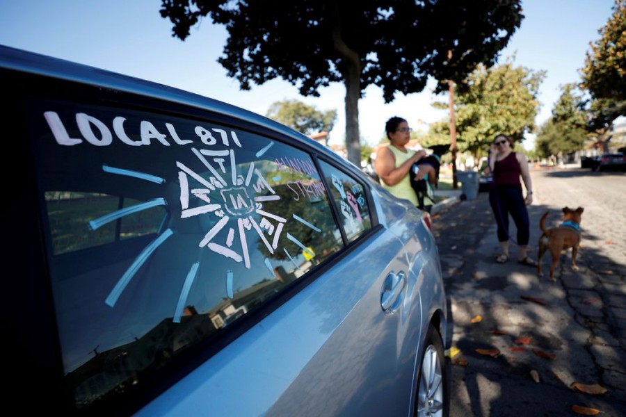 The adorned windows of the car belonging to script coordinator Amy Thurlow, a member of the International Alliance of Theatrical Stage Employees (IATSE) Local 871 since 2018, are pictured the day after 90 per cent of its members cast ballots and more than 98 per cent of the votes returned were in favour of authorising a strike in Glendale, California, US, October 5, 2021. REUTERS/Mario Anzuoni