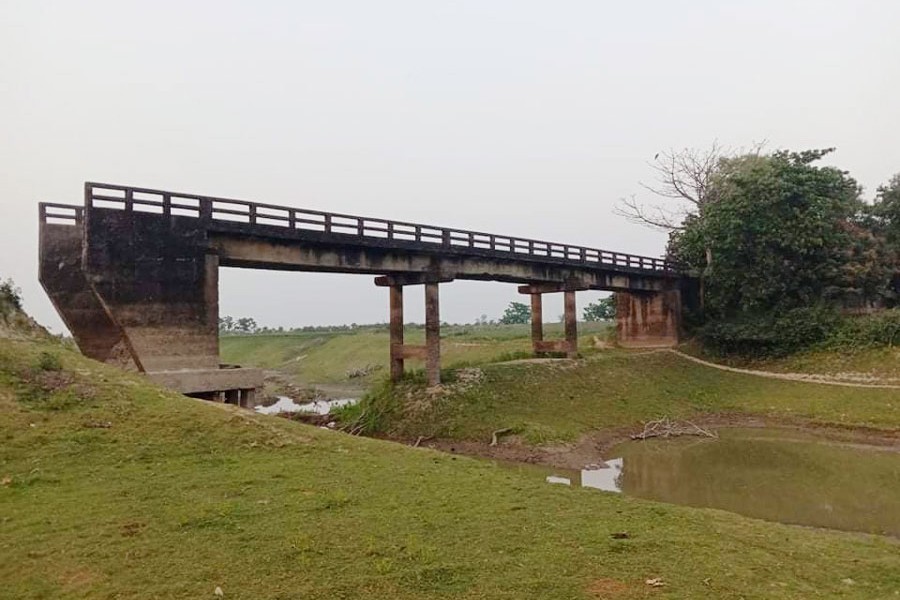 Photo shows precarious condition of the bridge on Madan Upazila's Tiyashree Union road in Netrakona district — FE Photo