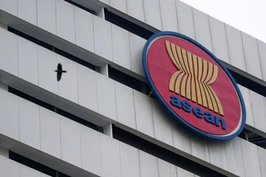 A bird flies near the Association of Southeast Asian Nations (ASEAN) secretariat building, ahead of the ASEAN leaders' meeting in Jakarta, Indonesia, April 23, 2021. REUTERS