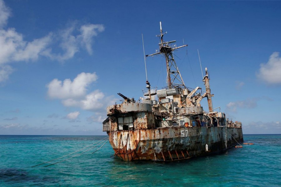 The BRP Sierra Madre, a marooned transport ship which Philippine Marines live on as a military outpost, is pictured in the disputed Second Thomas Shoal, part of the Spratly Islands in the South China Sea March 30, 2014. REUTERS/Erik De Castro