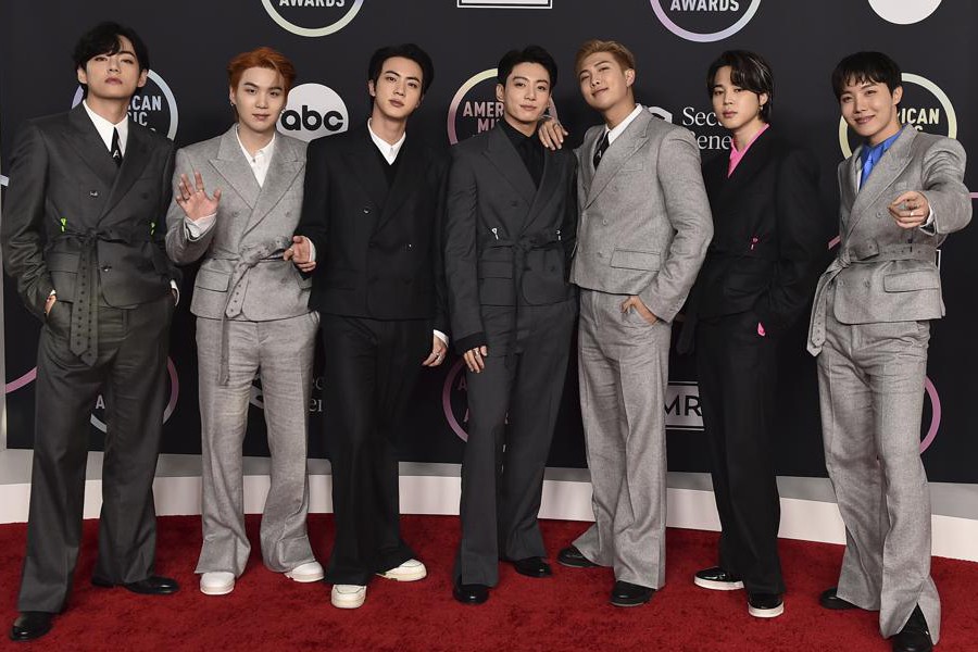 BTS arrives at the American Music Awards on Sunday, Nov. 21, 2021, at Microsoft Theater in Los Angeles. (Photo by Jordan Strauss/Invision/AP)