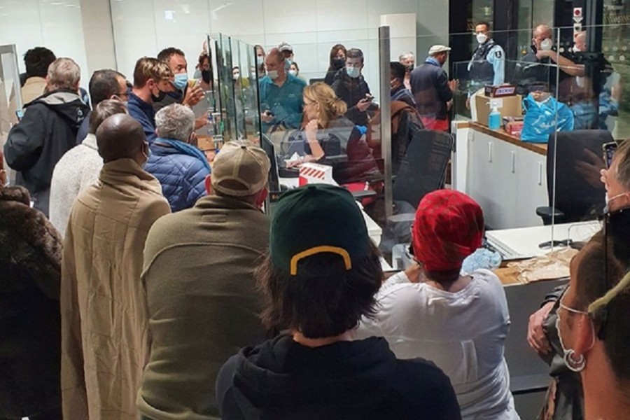 Passengers waiting on their coronavirus disease (COVID-19) test results at Schiphol Airport, in Amsterdam, the Netherlands in this picture obtained Nov 27, 2021 via social media. REUTERS