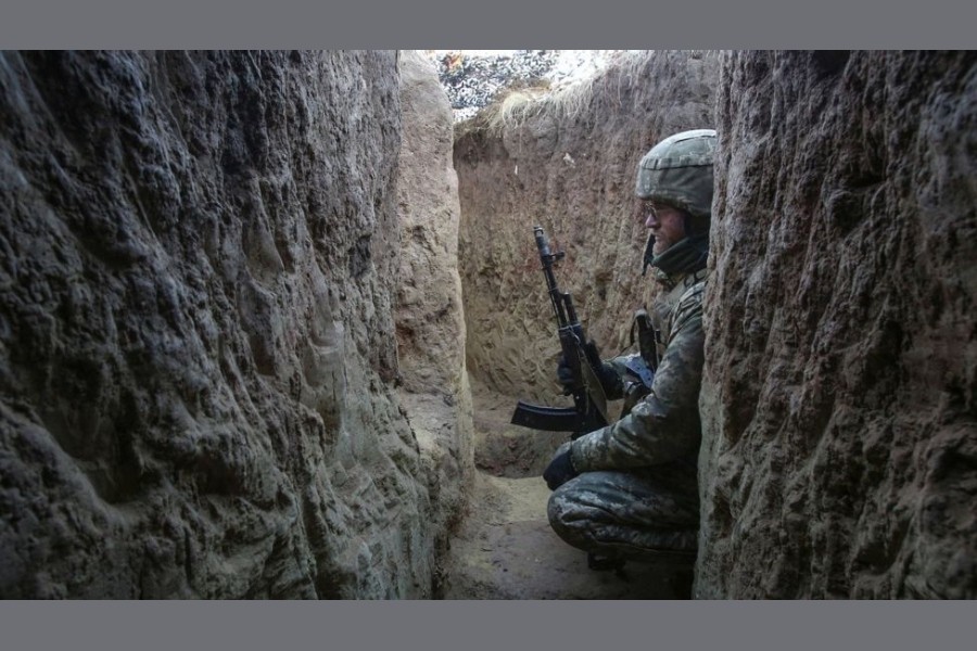 A Ukrainian government serviceman on the front line in Donetsk - EPA