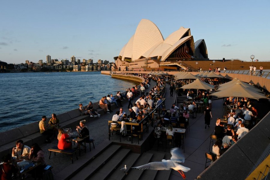 Patrons dine-in at a bar by the harbour in the wake of coronavirus disease (Covid-19) regulations easing, following an extended lockdown to curb an outbreak, in Sydney, Australia on October 22, 2021 — Reuters/Files