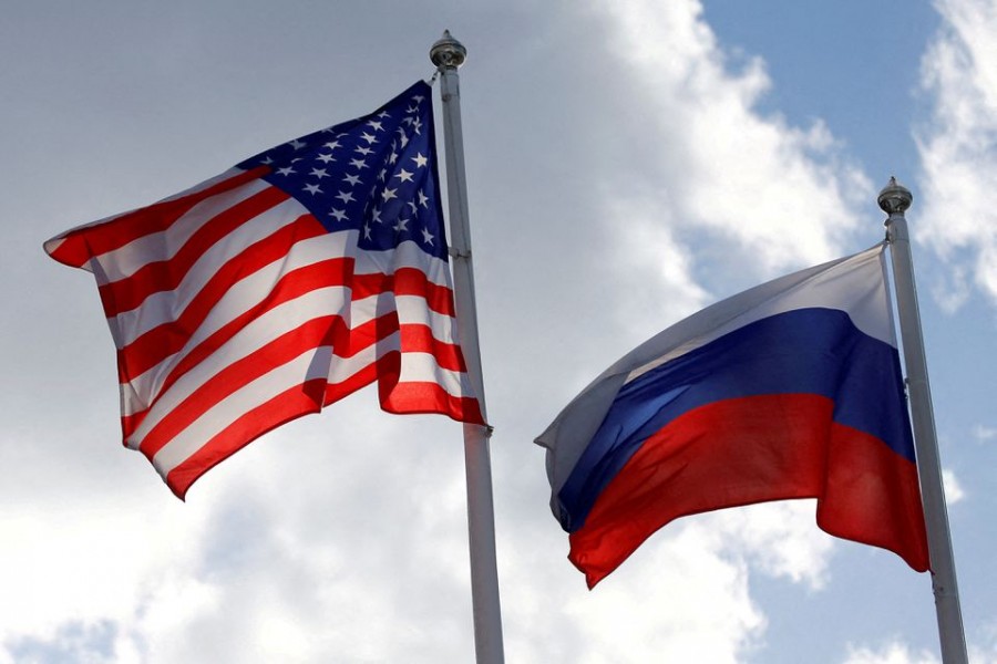 Russian and US state flags fly near a factory in Vsevolozhsk, Leningrad Region, Russia March 27, 2019 – Reuters/Files