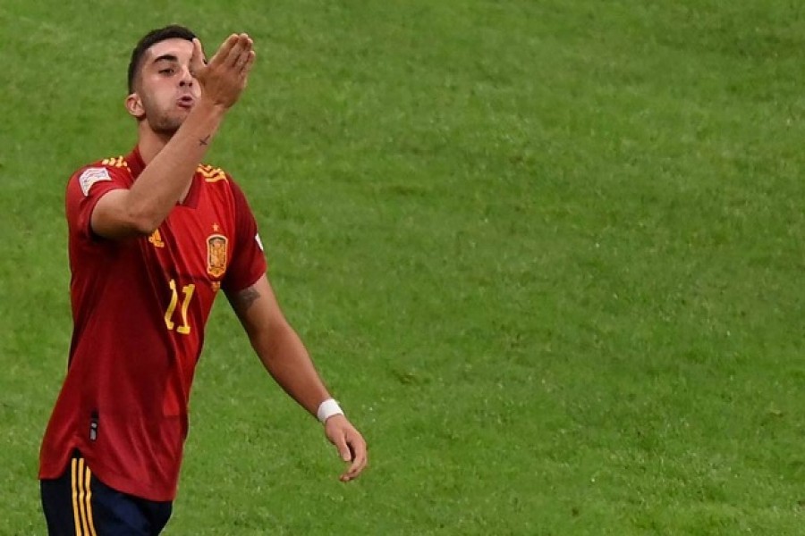 Football - UEFA Nations League - Semi Final - Italy v Spain - San Siro, Milan, Italy - October 6, 2021 Spain's Ferran Torres celebrates scoring their second goal Pool via REUTERS/Marco Bertorello