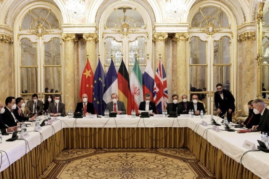 Deputy Secretary General of the European External Action Service (EEAS) Enrique Mora and Iran's chief nuclear negotiator Ali Bagheri Kani and delegations wait for the start of a meeting of the JCPOA Joint Commission in Vienna, Austria December 17, 2021. EU Delegation in Vienna – EEAS via Reuters