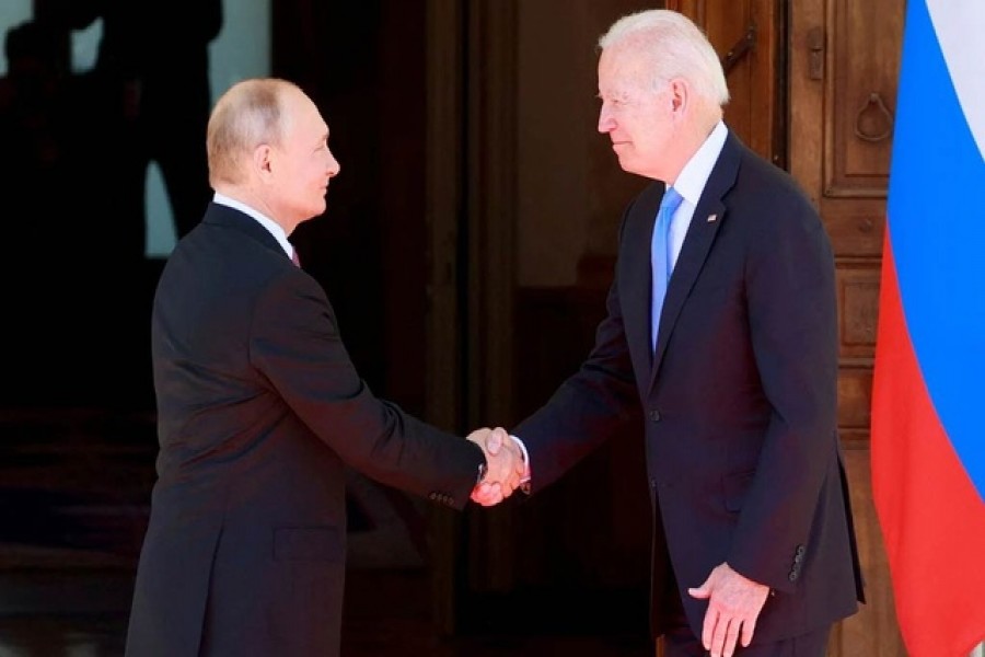 US President Joe Biden and Russia's President Vladimir Putin shake hands during the US-Russia summit at Villa La Grange in Geneva, Switzerland, June 16, 2021. REUTERS