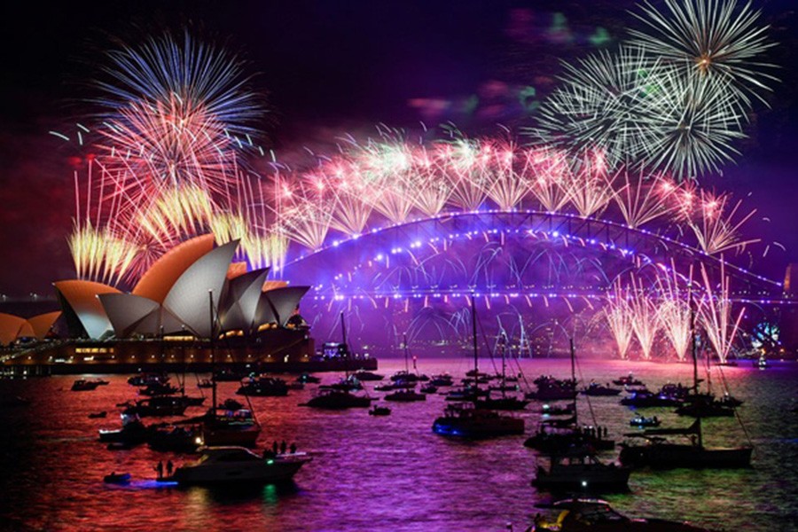 Fireworks explode over Sydney Harbour during New Year's Eve celebrations in Sydney, Australia, January 1, 2022. Reuters