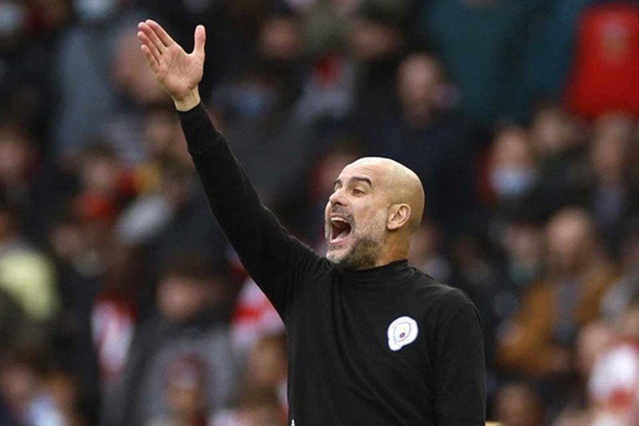 Football - Premier League - Arsenal v Manchester City - Emirates Stadium, London, Britain - January 1, 2022 Manchester City manager Pep Guardiola Action Images via Reuters/John Sibley