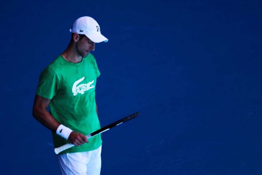 Serbian tennis player Novak Djokovic practices at Melbourne Park as questions remain over the legal battle regarding his visa to play in the Australian Open in Melbourne, Australia, January 13, 2022. (Reuters)