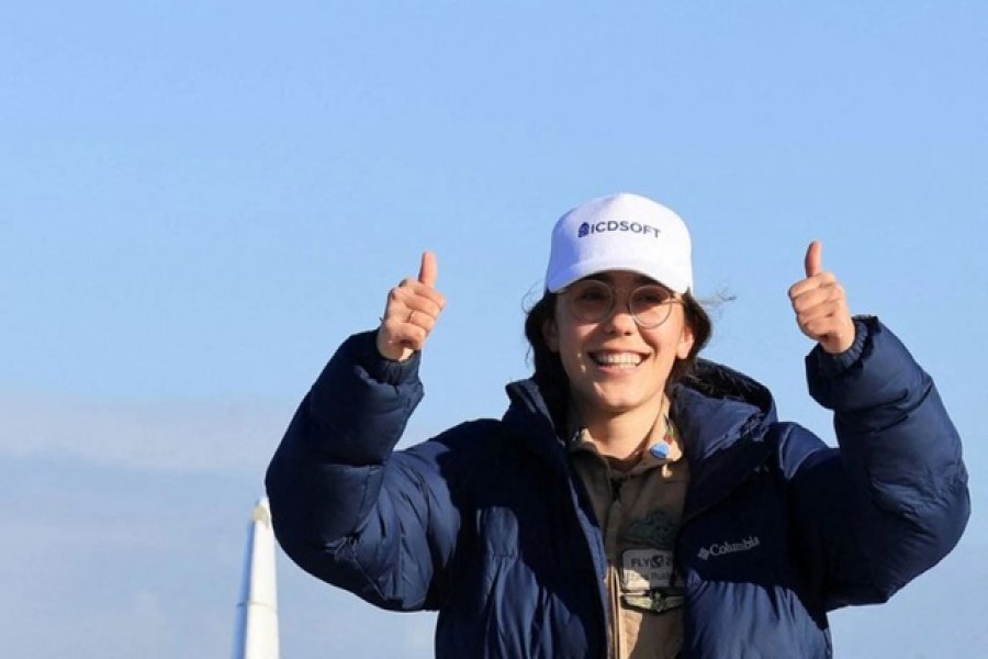 Belgian-British pilot Zara Rutherford, 19, gestures following her landing at Kortrijk-Wevelgem Airport, after a round-the-world trip in a light aircraft, becoming the youngest female pilot to circle the planet alone, in Wevelgem, Belgium, Jan 20, 2022 – Reuters/Pascal Rossignol