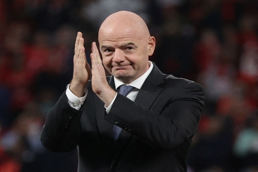 Soccer Football - African Super Cup - Final - Al Ahly SC v Raja Casablanca - Ahmed bin Ali Stadium, Al Rayyan, Qatar - December 22, 2021 FIFA president Gianni Infantino during the trophy ceremony REUTERS/Ibraheem Al Omari