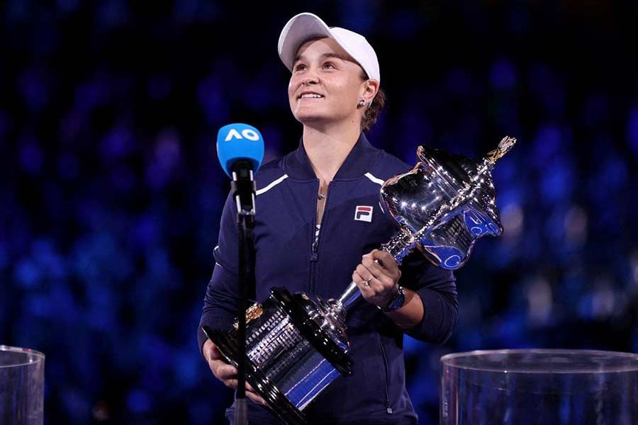 Tennis - Australian Open: Australia's Ashleigh Barty celebrating her win at the final against Danielle Collins of the US with the trophy on Saturday –Reuters photo