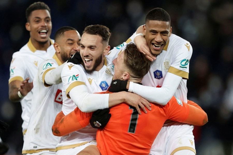 Parc des Princes, Paris, France - January 31, 2022 OGC Nice's Jean-Clair Todibo, Marcin Bulka and teammates celebrate winning the match after a penalty shootout –Reuters