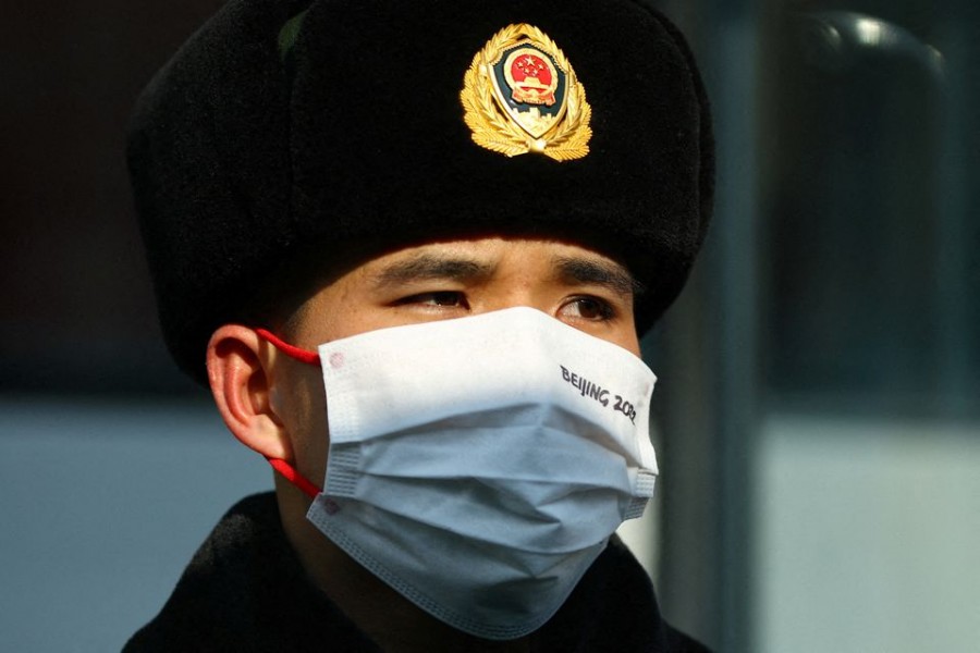 A Chinese soldier guards outside the short track speed skating venue at the Capital Indoor Stadium ahead of the Beijing 2022 Winter Olympics in Beijing, China January 31, 2022. REUTERS/Fabrizio Bensch/File Photo