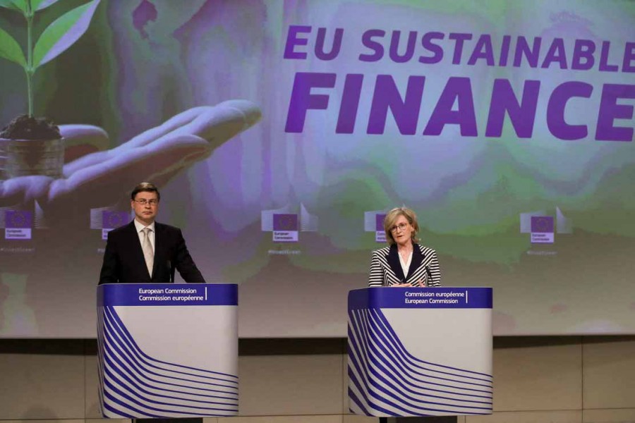 European Commission Vice-President Valdis Dombrovskis and European Commissioner for Financial Services, Financial Stability and the Capital Markets Union, Mairead McGuinness, give a media conference on the EU's climate change mitigation and adaptation taxonomy following a weekly meeting of EU Commission in Brussels, Belgium, April 21, 2021 – Olivier Hoslet/Pool via Reuters