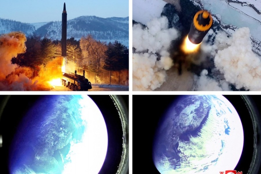 A combination image shows what appears to be a Hwasong-12 "intermediate and long-range ballistic missile" test, that state media KCNA says was carried out on Sunday, along with pictures reportedly taken from outer space with a camera at the warhead of the missle, in this image released on January 31, 2022. KCNA via REUTERS