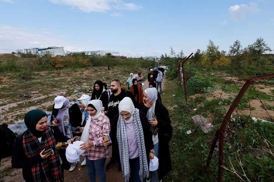 Palestinians visiting Gaza Valley during a trip organised by the United Nations in central Gaza Strip on Sunday  -Reuters photo