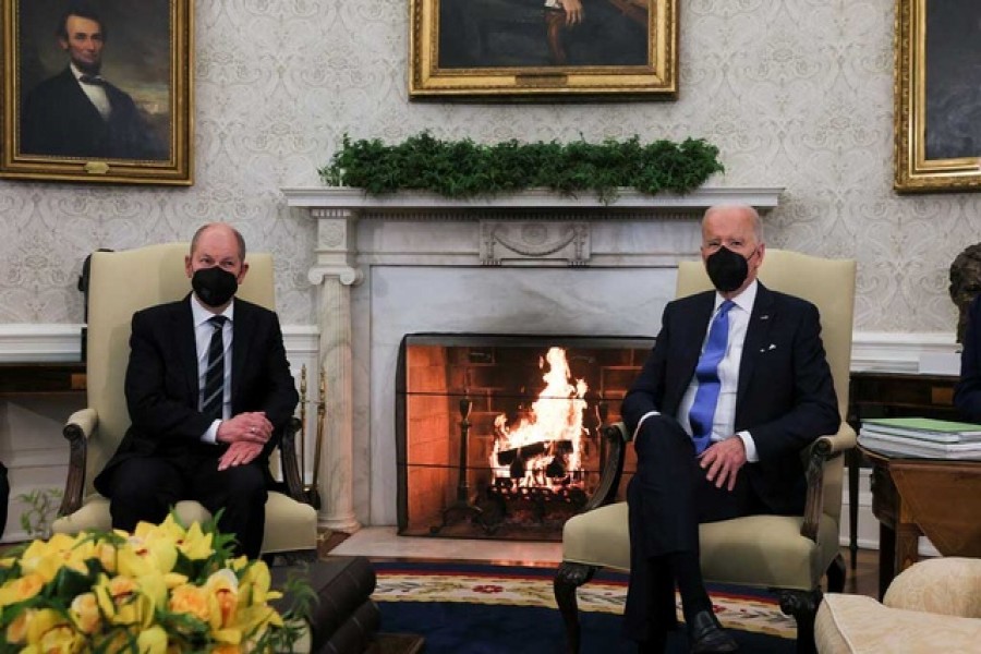 US President Joe Biden meets with Germany’s Chancellor Olaf Scholz in the Oval Office at the White House in Washington, US, February 7, 2022 – Reuters