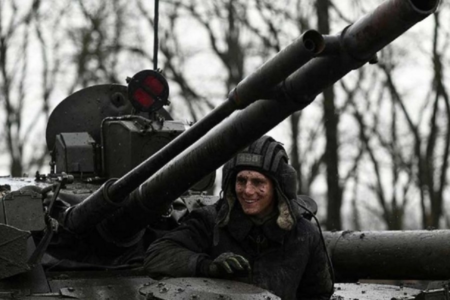 A Russian service member is seen on a BMP-3 infantry fighting vehicle during drills held by the armed forces of the Southern Military District at the Kadamovsky range in the Rostov region, Russia February 3, 2022. REUTERS/Sergey Pivovarov