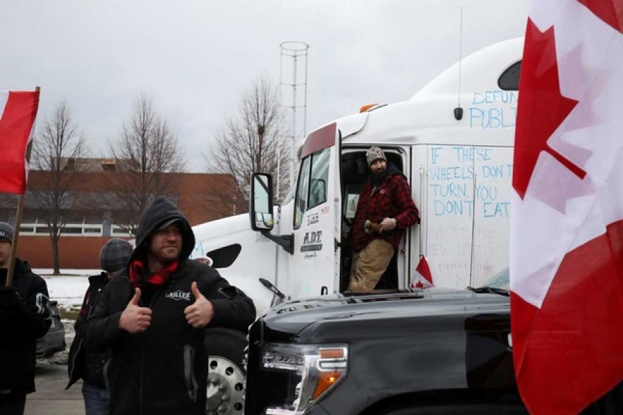 Canada-US border city seeks court order to remove protesting truckers