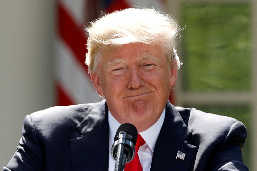 US President Donald Trump pauses as he announces his decision that the United States will withdraw from the landmark Paris Climate Agreement, in the Rose Garden of the White House in Washington, US on June 1, 2017  — Reuters/Files