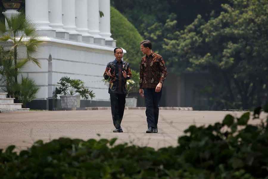 Indonesian President Joko Widodo and Dutch Prime Minister Mark Rutte walking at the presidential palace of Indonesia on October 7 in 2019 –Reuters file photo