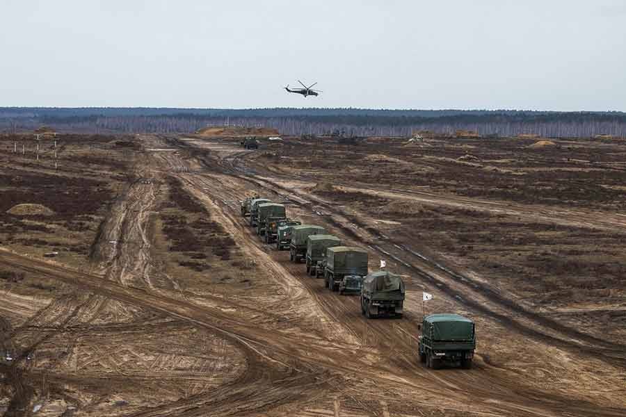 A helicopter flying over troops during the joint military drills of the armed forces of Russia and Belarus at a firing range in the Brest Region of Belarus on Saturday –Reuters photo