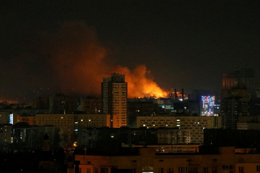 Smoke and flames rise over during the shelling near Kyiv, as Russia continues its invasion of Ukraine February 26, 2022. REUTERS/Gleb Garanich