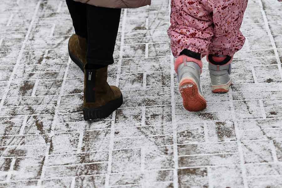 People walking on a train platform as refugees flee Russia's invasion of Ukraine towards Poland, in the train station in Lviv of Ukraine on Saturday –Reuters photo