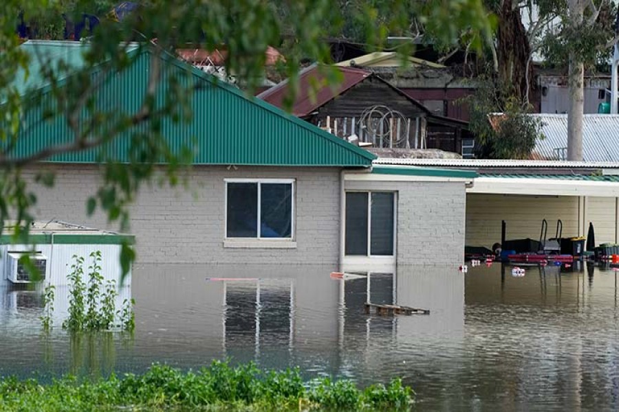 A building is surrounded by flood waters in Londonderry on the outskirts of Sydney, Australia, on Thursday - AP photo