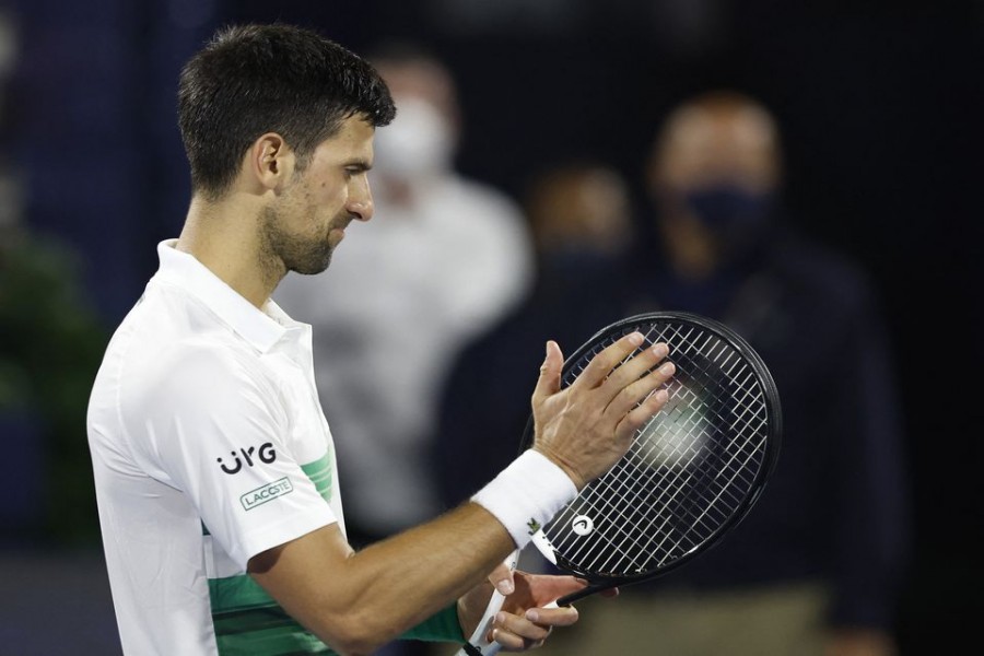 Tennis - ATP 500 - Dubai Tennis Championships - The Dubai Duty Free Tennis Centre, Dubai, United Arab Emirates - February 24, 2022 Serbia's Novak Djokovic looks dejected after he loses his quarter final match against Czech Republic's Jiri Vesely REUTERS/Suhaib Salem