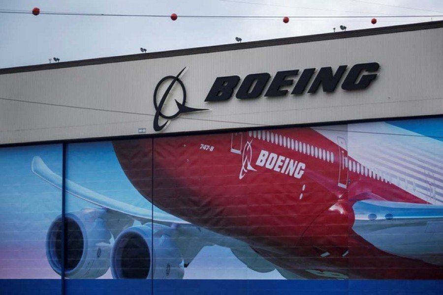 FILE PHOTO: A Boeing logo is seen at the company's facility in Everett, Washington, US January 21, 2020. REUTERS/Lindsey Wasson/File Photo