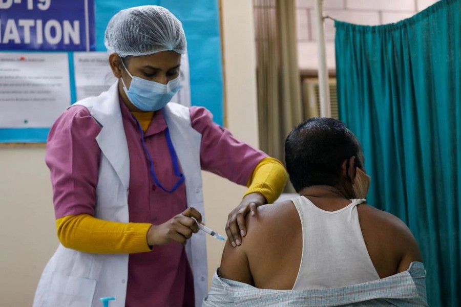 A man receives a Bharat Biotech's Covid-19 vaccine called COVAXIN, at a vaccination centre, in New Delhi, India on February 13, 2021 — Reuters/Files