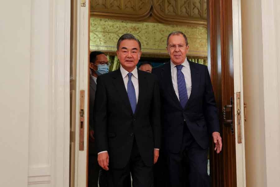 China, Russia 'more determined' to develop bilateral ties, Beijing says