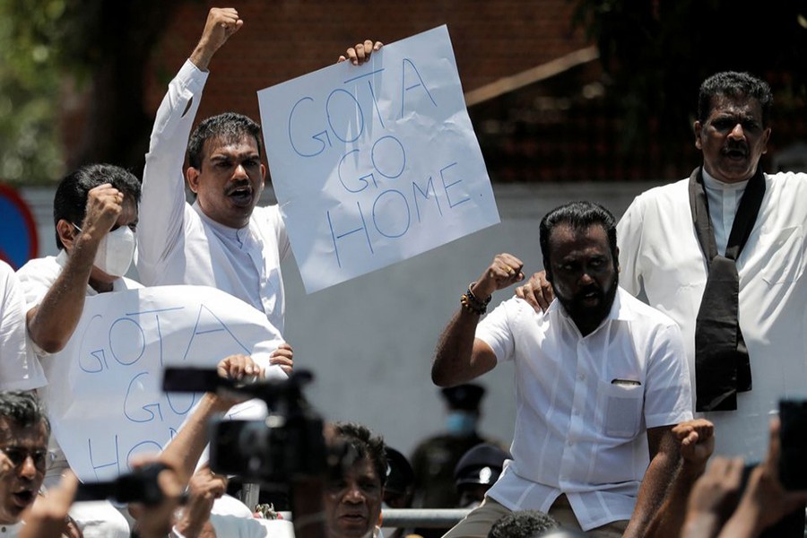 Members of opposition alliance, Samagi Jana Balawegaya shout slogans against President Gotabaya Rajapaksa near Independence Square after the government imposed a curfew following a clash between police and protestors near Sri Lankan President Gotabaya Rajapaksa's residence during a protest last Thursday, amid the country's economic crisis, in Colombo, Sri Lanka on April 3, 2022 — Reuters photo