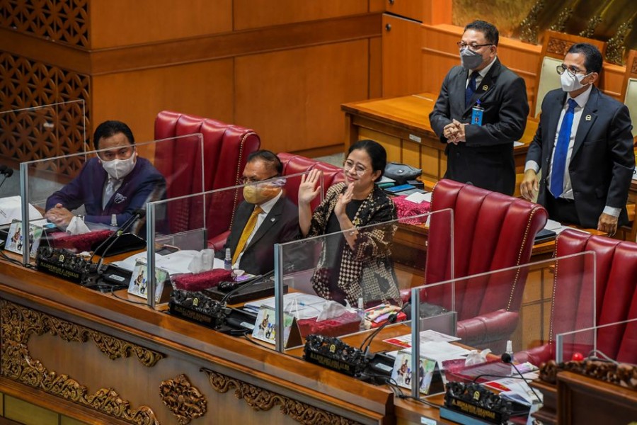 Speaker of the House Puan Maharani waves after Indonesia's parliament passed a bill to tackle sexual violence, in Jakarta, Indonesia, April 12, 2022. Antara Foto/Galih Pradipta/ via REUTERS