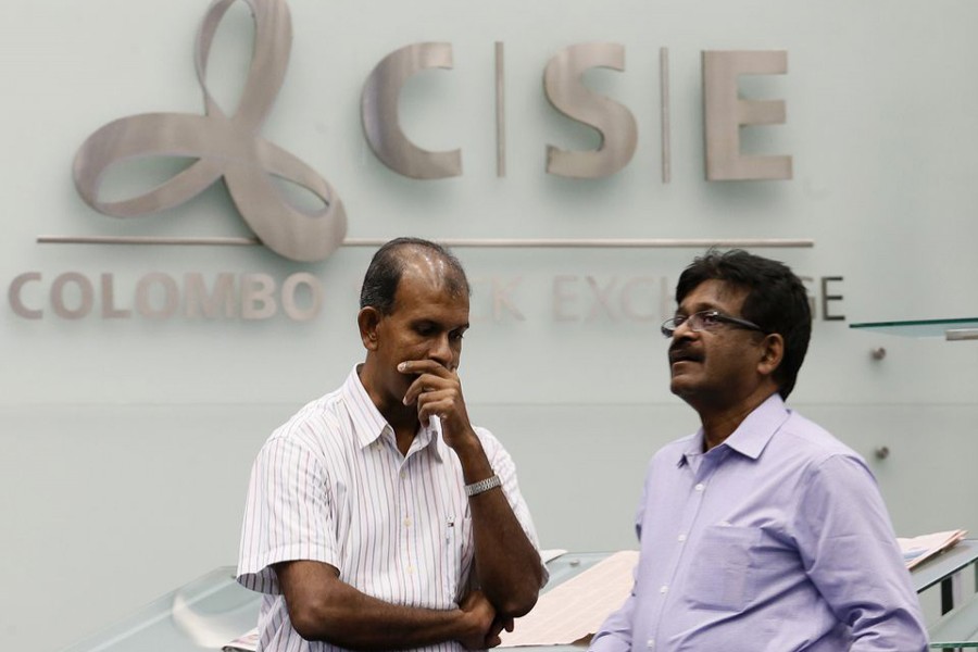 Investors react at the Colombo Stock Exchange in Sri Lanka on March 9, 2016 — Reuters/Files