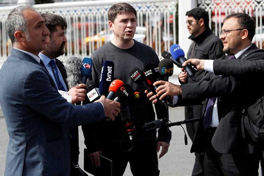 Mykhailo Podolyak, a political adviser to Ukrainian President Volodymyr Zelensky, receives questions from a member of the media after a meeting with Russian negotiators in Istanbul, Turkey on March 29, 2022 — Reuters photo