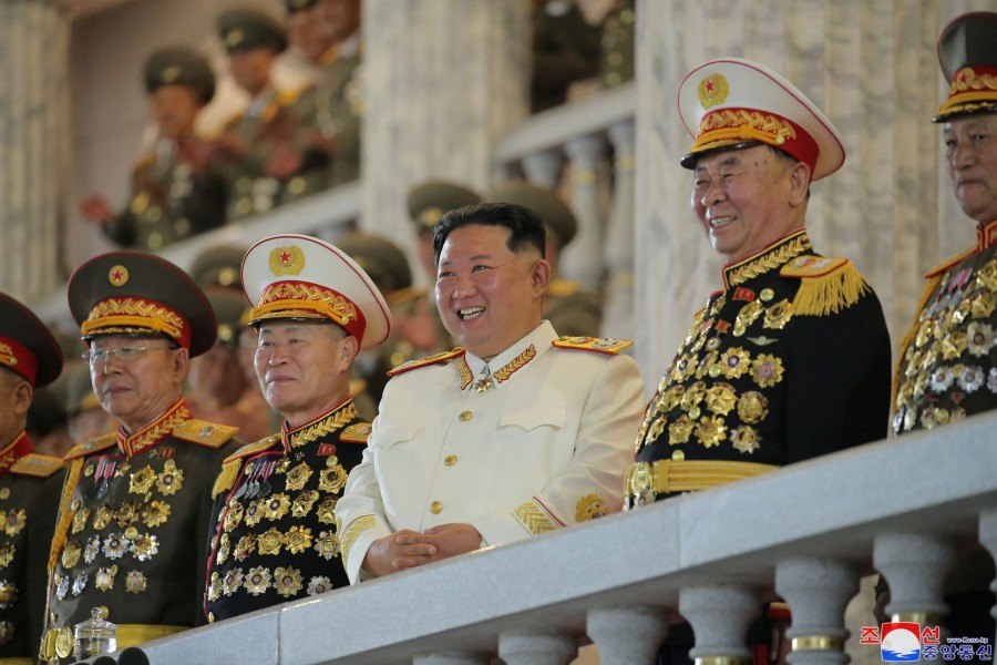 North Korean leader Kim Jong Un watches a nighttime military parade to mark the 90th anniversary of the founding of the Korean People's Revolutionary Army in Pyongyang, North Korea, in this undated photo released by North Korea's Korean Central News Agency (KCNA) on April 26, 2022. KCNA via REUTERS