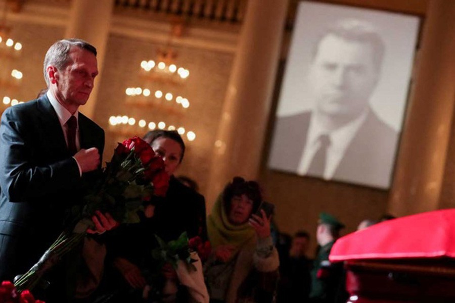 Sergei Naryshkin, head of Russia's foreign intelligence agency, pays his respects to the leader of the Liberal Democratic Party of Russia (LDPR) Vladimir Zhirinovsky during a memorial service at the Column Hall of the House of Unions in Moscow, Russia April 8, 2022. Russian State Duma/Handout via REUTERS