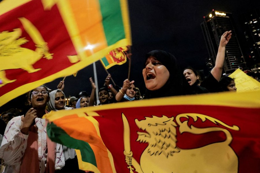 Protestors shout slogans against Sri Lankan President Gotabaya Rajapaksa near the Presidential Secretariat, amid the country's economic crisis in Colombo, Sri Lanka, April 11 2022. REUTERS/Dinuka Liyanawatte