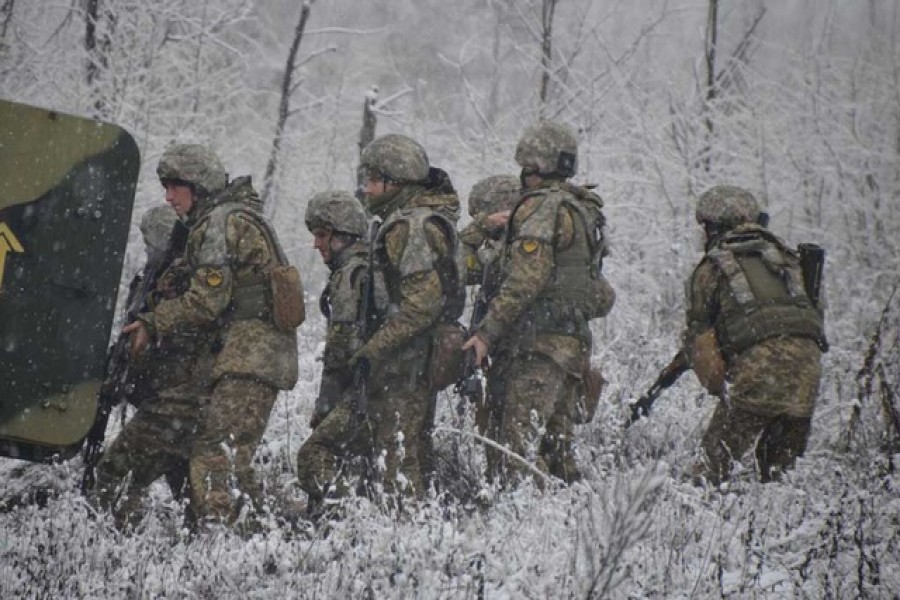 Service members of the 92nd Separate Mechanized Brigade of the Ukrainian Armed Forces take part in military drills at a shooting range in Kharkiv region, Ukraine, in this handout picture released December 20, 2021. Press Service of the 92nd Separate Mechanized Brigade/Handout via Reuters